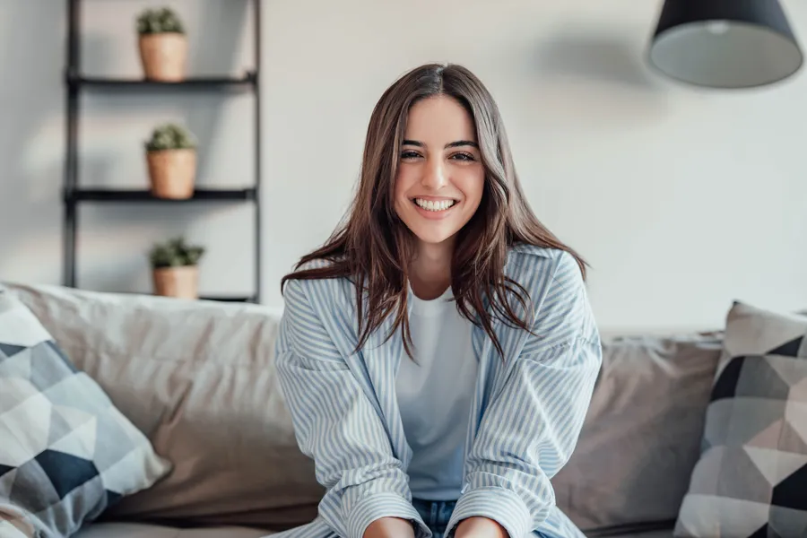 Young woman smiling confidently